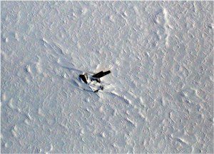 This image shows the Kee Bird, a wrecked B-29 Superfortress that made an emergency landing on a northwest Greenland ice sheet in 1947. The image was acquired on May 1, 2014, by the Digital Mapping System (DMS), an instrument attached to NASA’s P-3 Orion aircraft, which is being flown as part of the Operation IceBridge campaign.