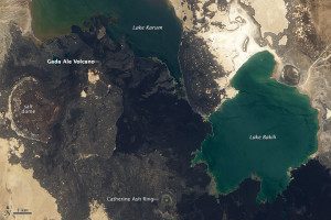 Acquired on June 27, 2014, this Landsat 8 image shows a few of the diverse and compelling features of the Danakil Depression. Chief among them is Gada Ale, a 287-meter (942-foot) stratovolcano built of lava and ash that has a crater lake full of boiling mud and sulfurous gases. Basalt lava from the volcano paints the surrounding terrain a dark hue, with the youngest flows being the darkest colors in the satellite image.