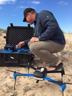 Dr. Chet Walker prepares a rotary drone for a mapping mission at Bahia Adair. His firm recently joined PaleoWest Archaeology to provide 3D aerial mapping and nondestructive archaeological sensing techniques.