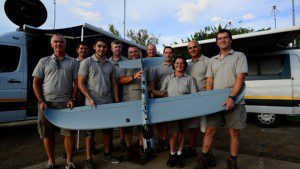 Staff members of South Africa-based UAV & Drone Solutions hold one of their drones for the Air Shepherd Initiative. Where these drones have been deployed, poaching has stopped. (Credit: Michael Romondo)
