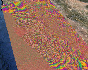 By combining “before and after” Sentinel-1A satellite radar scans, the rainbow-colored patterns show how the surface of Chile shifted as a result of a September earthquake. (Credit: Contains modified Copernicus Sentinel data (2015)/ESA SEOM INSARAP study PPO.labs/NORUT)