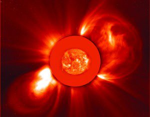 This “Best of SOHO” image by the observatory’s LASCO C2 coronograph from Nov. 8, 2000, shows what appears to be two coronal mass ejections heading in symmetrically opposite directions from the sun. (Credit: ESA/NASA/SOHO)