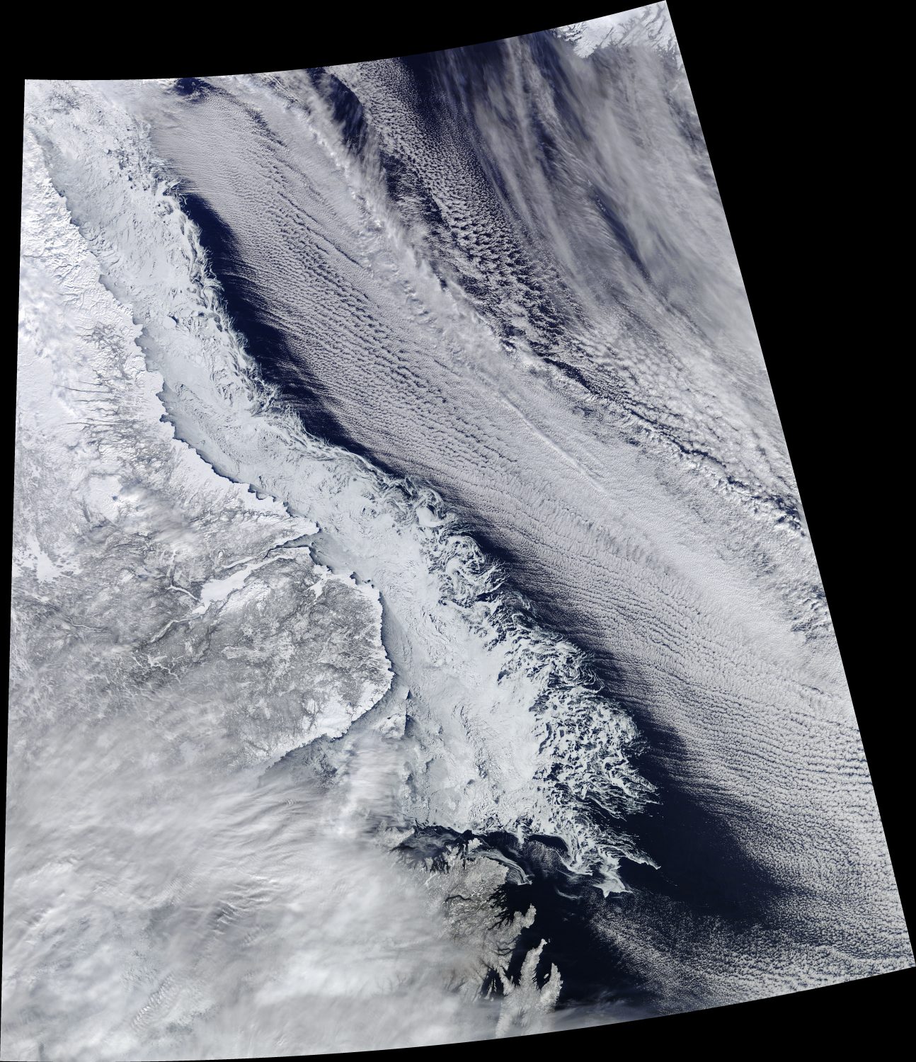 An Intersection of Land, Ice, Sea and Clouds